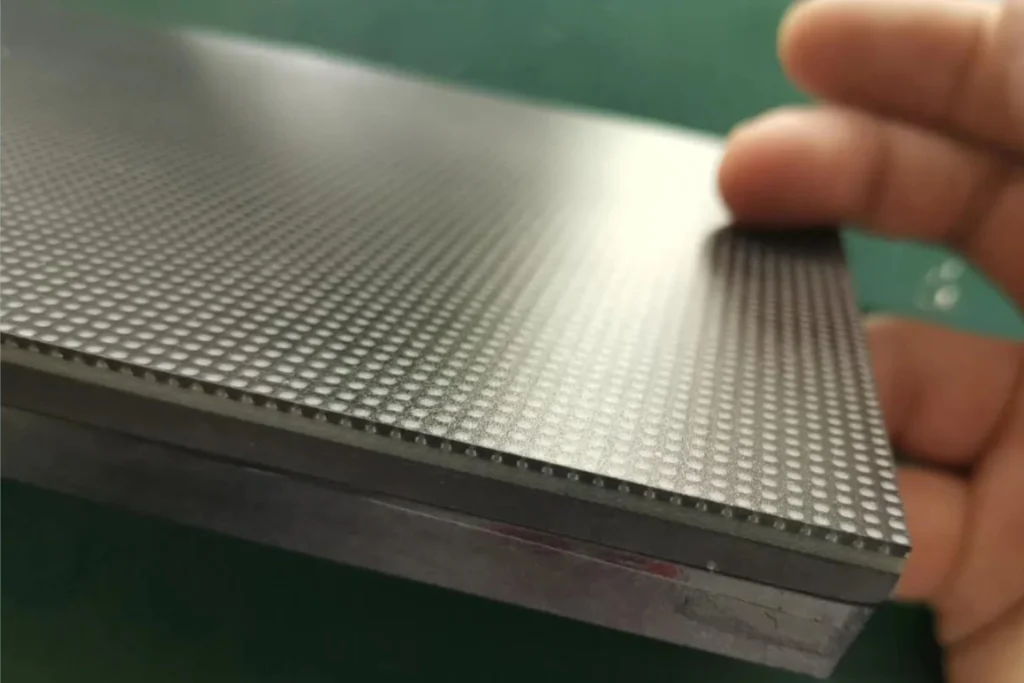 Close-up view of an LED display module showing pixel structure and surface texture